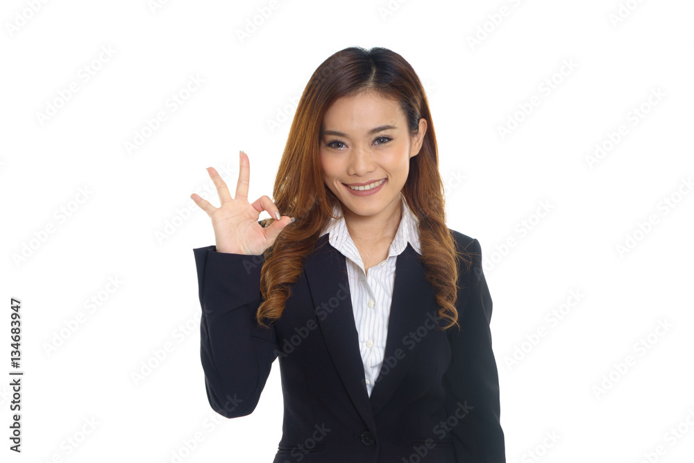 Asian Businesswoman with ok sign gesture on white background Asian Businesswoman with ok sign gesture on white background