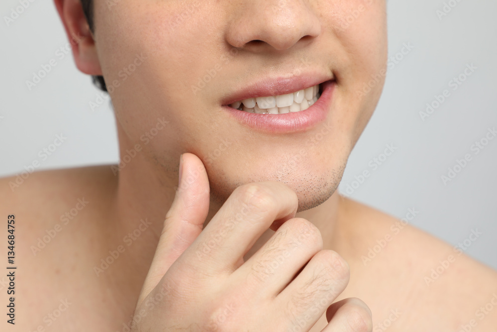Close-up of a young man's mouth Close-up of a young man's mouth