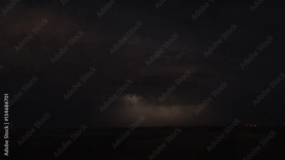 Lightning Threads Through Thunderhead at Night Lightning Threads Through Thunderhead at Night