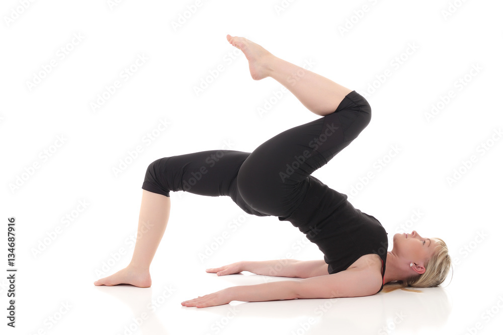 young yoga female doing yogatic exercise