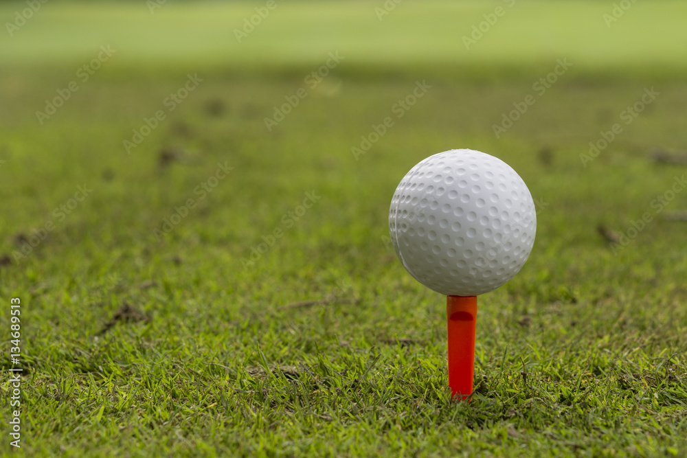 Golf ball on a tee