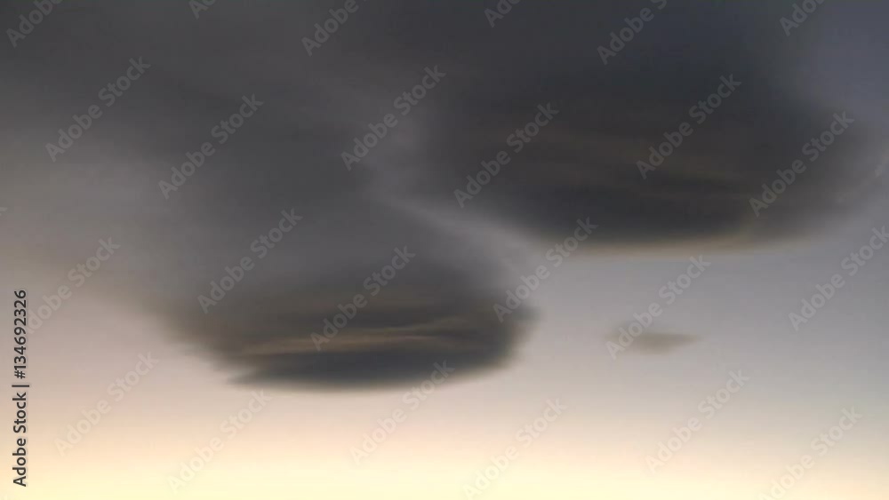 Mountain Wave Lenticulars at Dusk Mountain Wave Lenticulars at Dusk