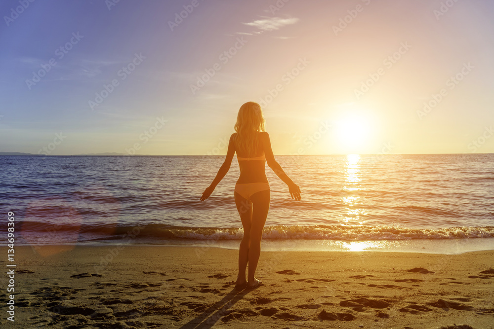 Happy Carefree Woman on the Beach Happy Carefree Woman on the Beach