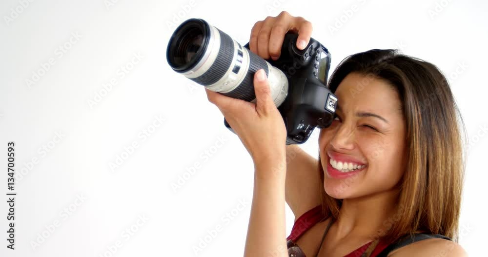 Photographer taking photo with digital camera in studio 4k Photographer taking photo with digital camera in studio 4k