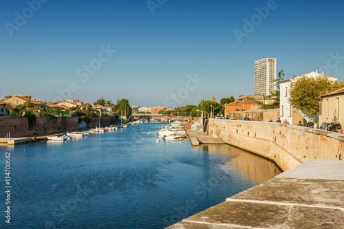 Sunset view from bridge of Tiberius (Ponte di Tiberio) in Rimini, Emilia-Romagna region, Italy.