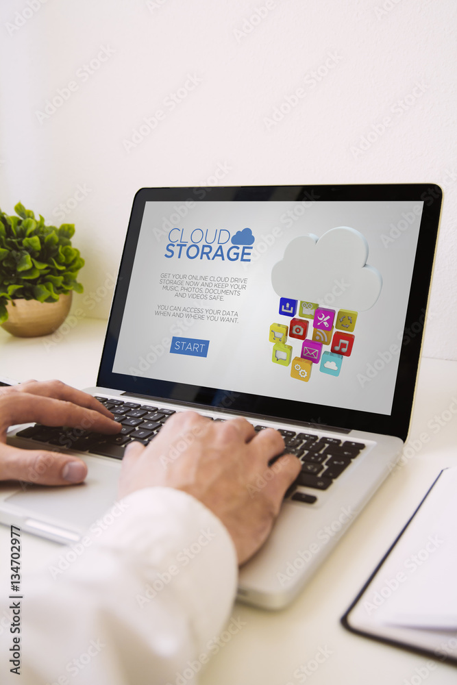 laptop hands cloud storage