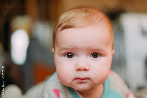 Handsome cute baby boy at home