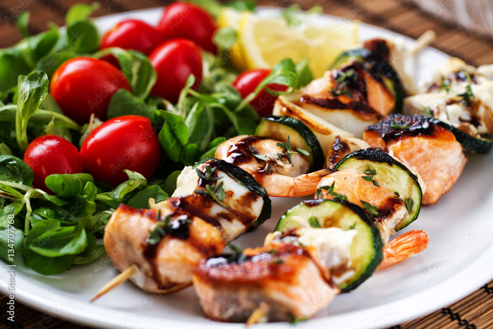 Fish skewers with salad Fish skewers with salad