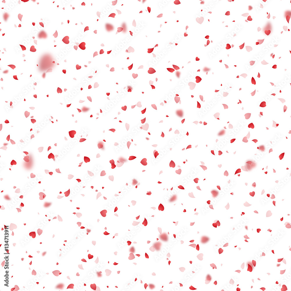 Valentines Day background of red hearts petals falling on white background
