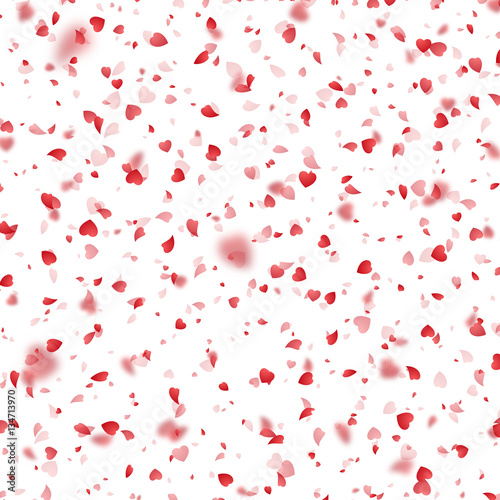 Valentines Day background of red hearts petals falling on white background. Symbol of love for the label gift packages. Flower petal in shape of heart confetti. Decor pink element for greeting cards.