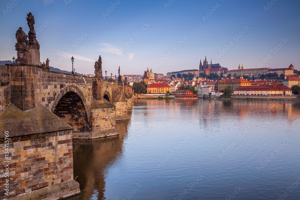 Prague. Cityscape image of Prague with Charles Bridge during sunrise.