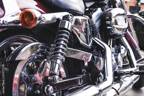 Shiny chrome motorcycle details closeup