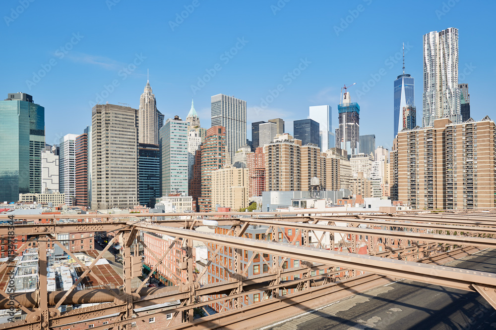 New York city buildings view from Brooklyn Bridge, empty street