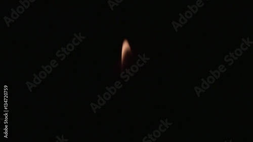 Candle light got off by fingers touch in slow motion