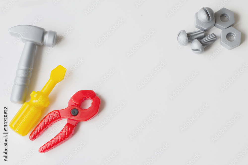Children's plastic toy. Children's tool. hammer, pliers, screwdr Children's plastic toy. Children's tool. hammer, pliers, screwdr