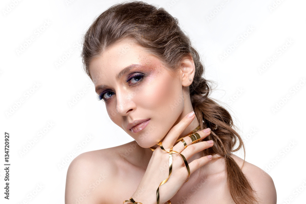 Portrait of a beautiful woman on a white background.