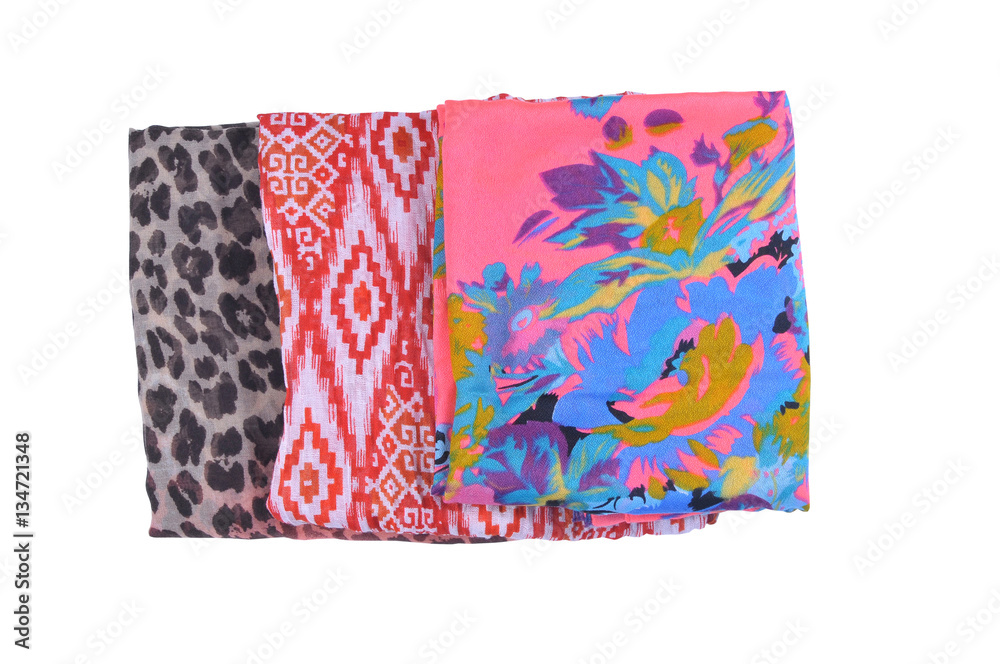 Scarf isolated on white background. kerchief top view. set of three colored scarves, folded Scarf isolated on white background. kerchief top view. set of three colored scarves, folded