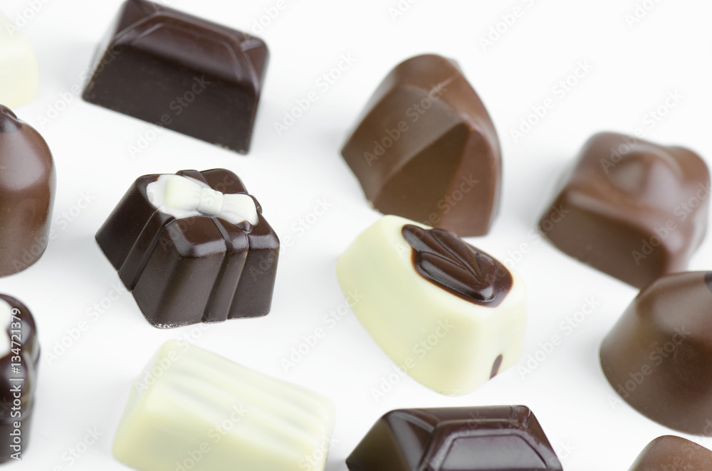 Assortment Of Fine Chocolates In White, Dark And Milk Chocolate Closeup Assortment Of Fine Chocolates In White, Dark And Milk Chocolate Closeup