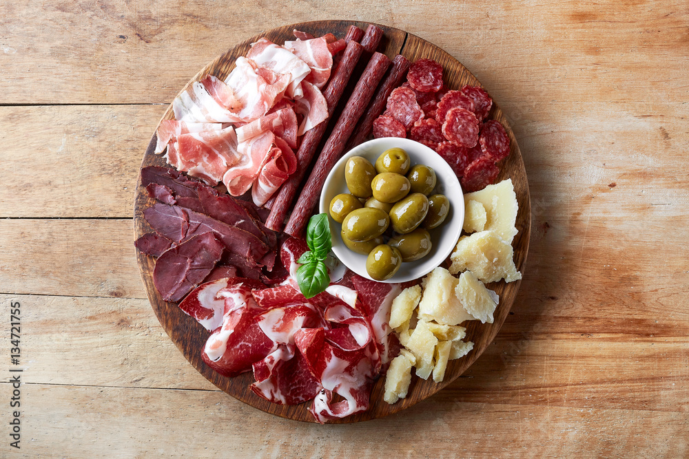 Cold smoked meat and cheese plate
