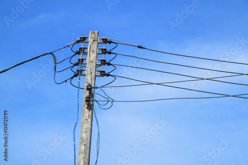 Electrical poles of high voltage blue sky background