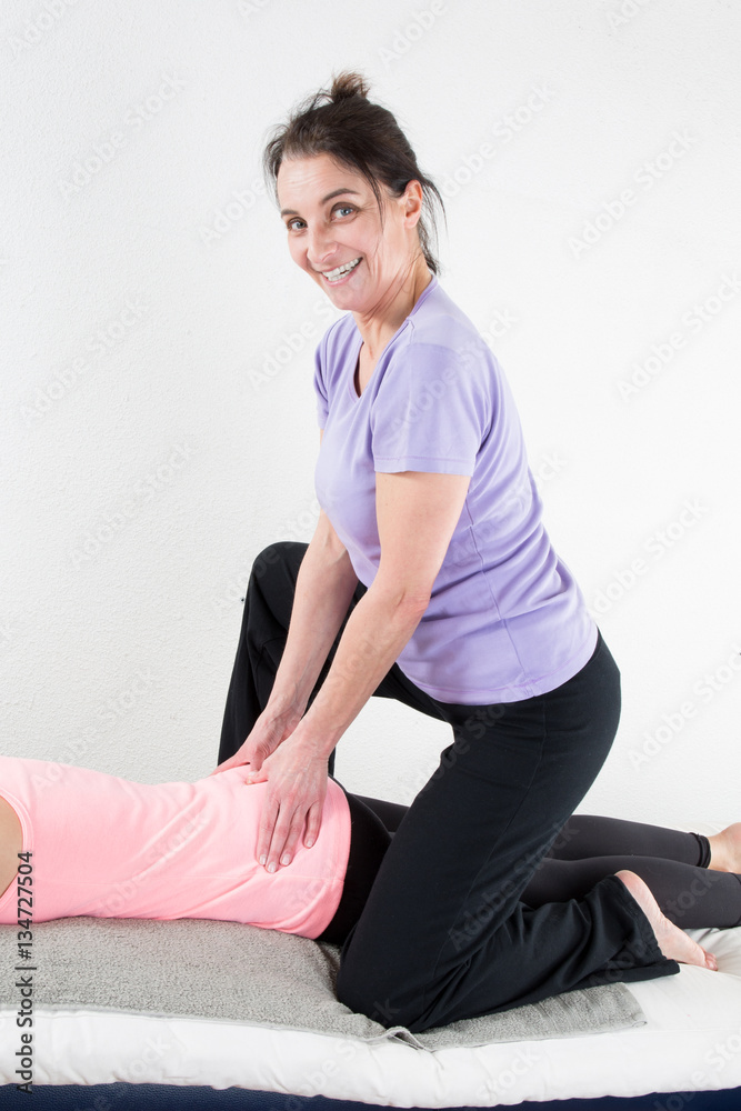 Beautiful woman enjoying professional massage Beautiful woman enjoying professional massage