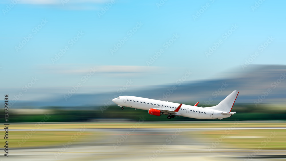 Fototapeta premium Airplane take off. Motion blur effect.