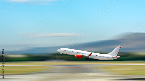 Airplane take off. Motion blur effect.