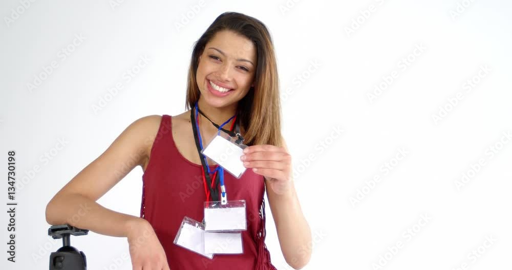 Portrait of smiling photographer showing identity card in studio 4k Portrait of smiling photographer showing identity card in studio 4k