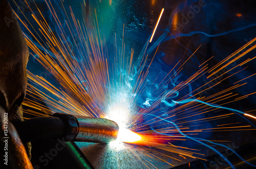 Industrial steel welder in factory technical,