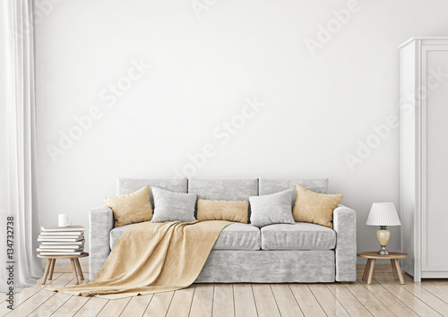 Livingroom Interior with sofa, pillows and plaid on empty white wall background. 3D rendering.