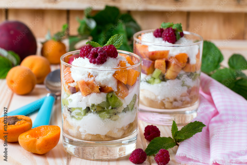 Healthy fruit salad in the glass bowl