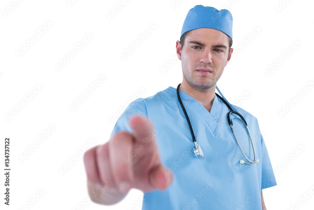 Surgeon pretending to be using futuristic digital screen Surgeon pretending to be using futuristic digital screen