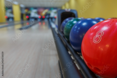 Bowling balls return machine  alley background