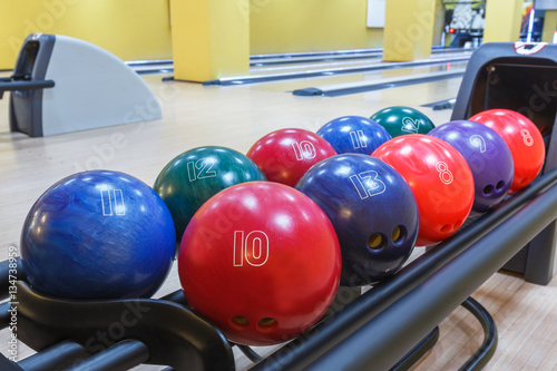 Bowling balls return machine  alley background