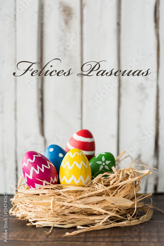 Easter eggs in raffia nest