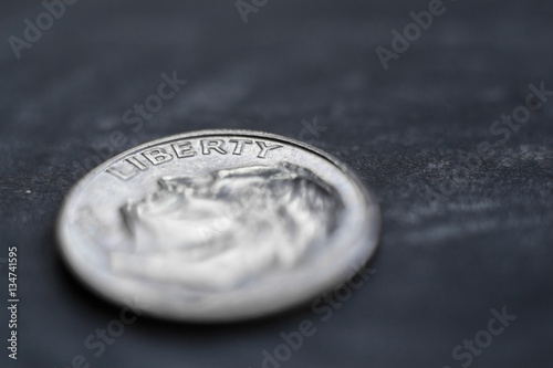 One dime coin - focus on Liberty - left side