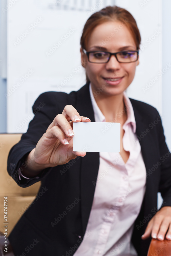 Attractive woman with a card in the hand Attractive woman with a card in the hand