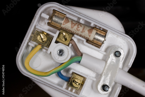 Wiring of a British three pin electrical plug. photo