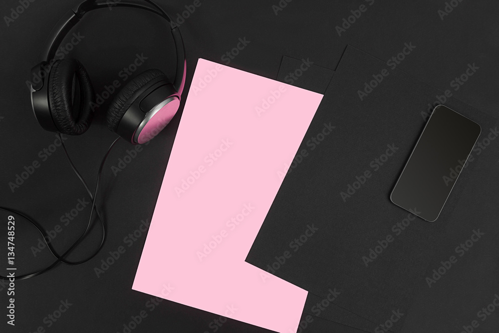 Top view of office supplies on blackboard background with copy space. Top view of office supplies on blackboard background with copy space.