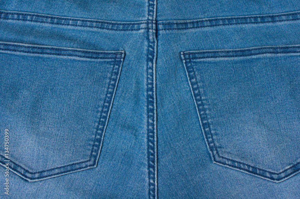 Jeans background of blue denim textile Jeans background of blue denim textile