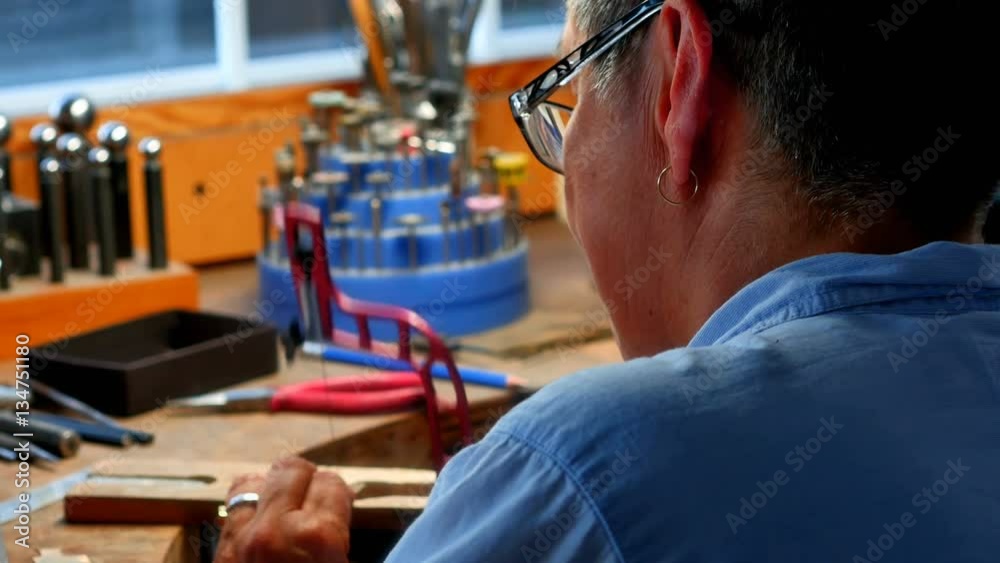 Close-up of craftswoman working in workshop 4k