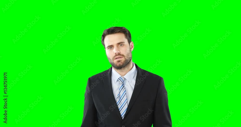 Businessman touching digital screen against green background 4k Businessman touching digital screen against green background 4k