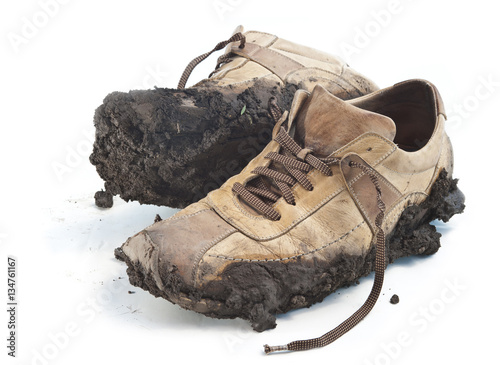 Isolated muddy footwear shoes photo