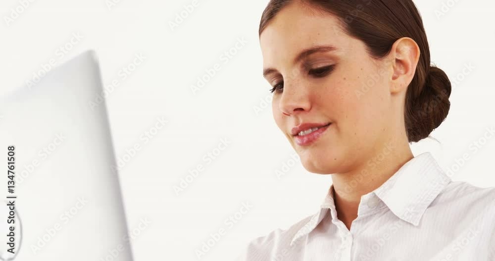 Businesswoman using laptop against white background 4k Businesswoman using laptop against white background 4k