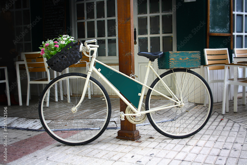 vintage Bicycle with basket of flowers