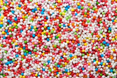 Multicoloured sweet sugar balls. Small ball pattern.