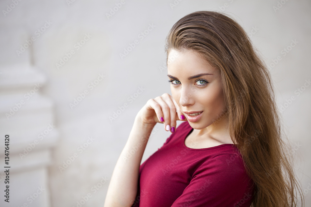 Portrait of a young beautiful brunette woman