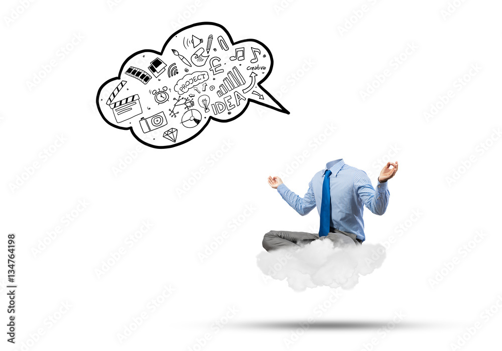 Headless businessman meditating Headless businessman meditating
