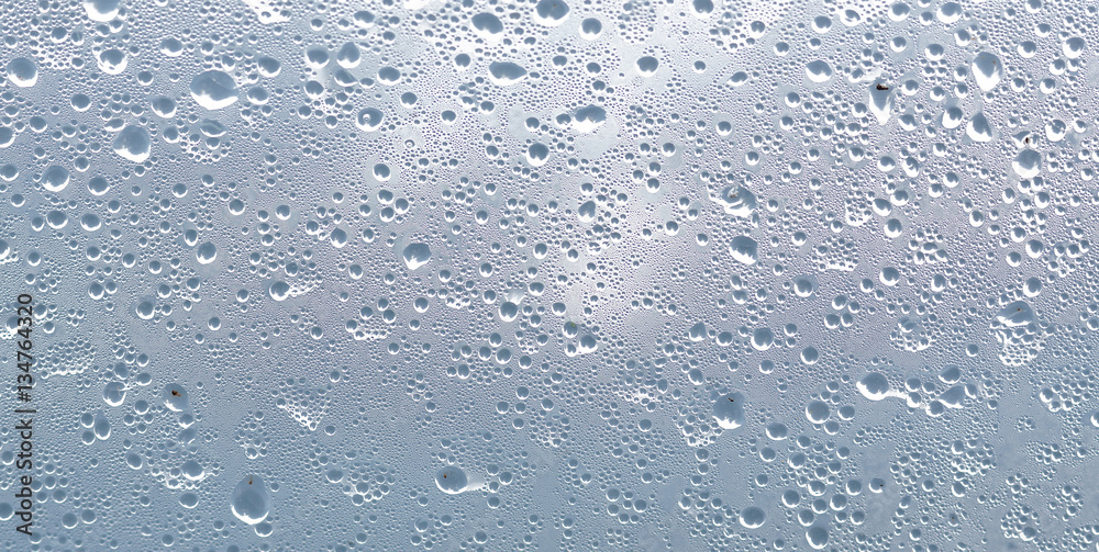Misted frosted glass with big and small drops, wallpaper Misted frosted glass with big and small drops, wallpaper