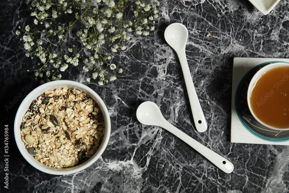 Fototapeta premium Granola served with coffee,milk,fruits